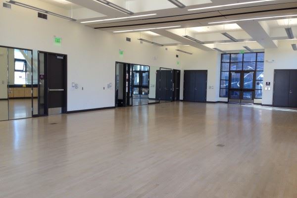 A large room with windows along the walls 1