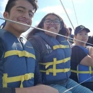 Youth wearing life jackets Youth wearing life jackets